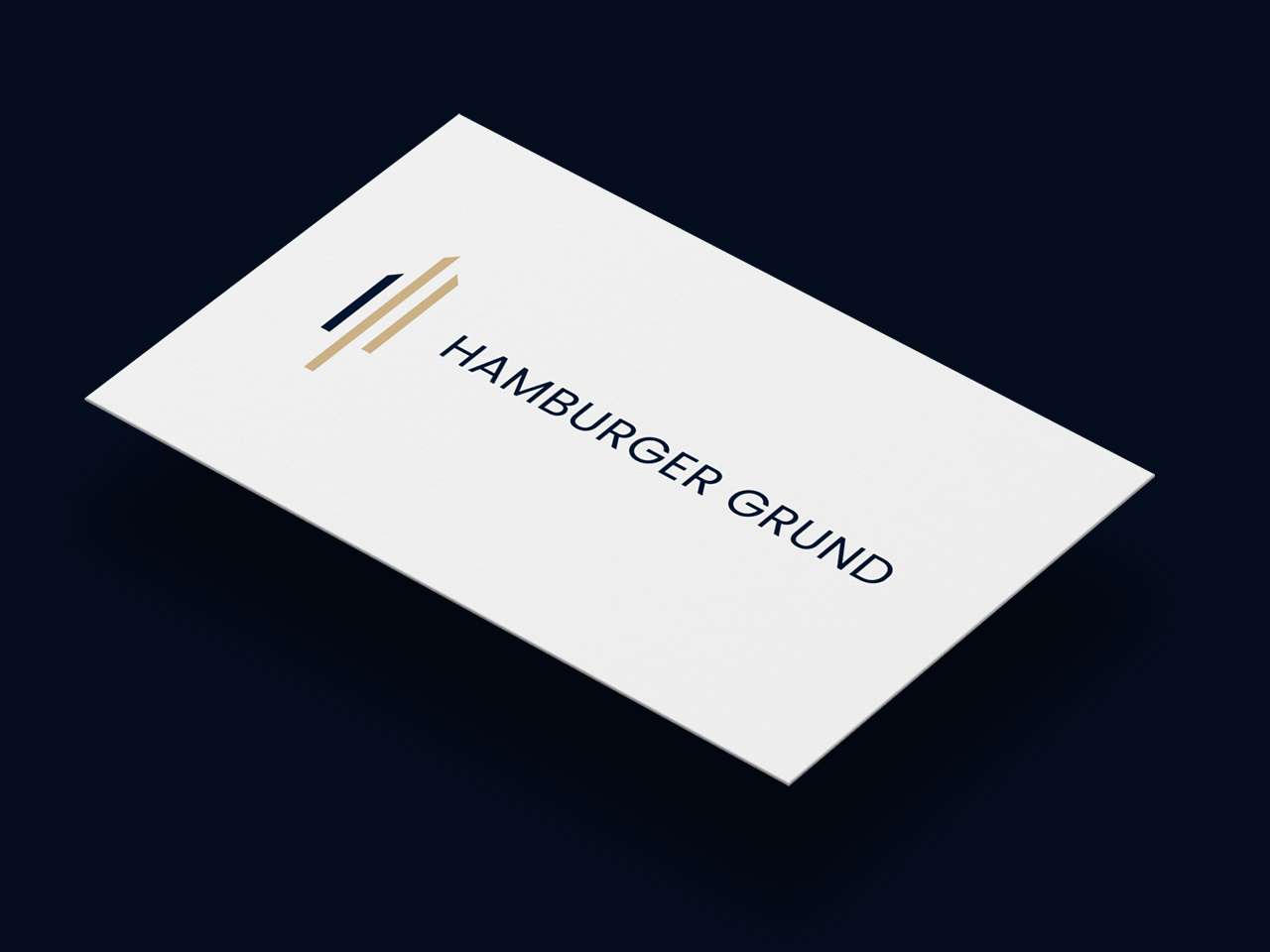 Detailansicht einer Visitenkarte von Hamburger Grund in weiß mit Logo